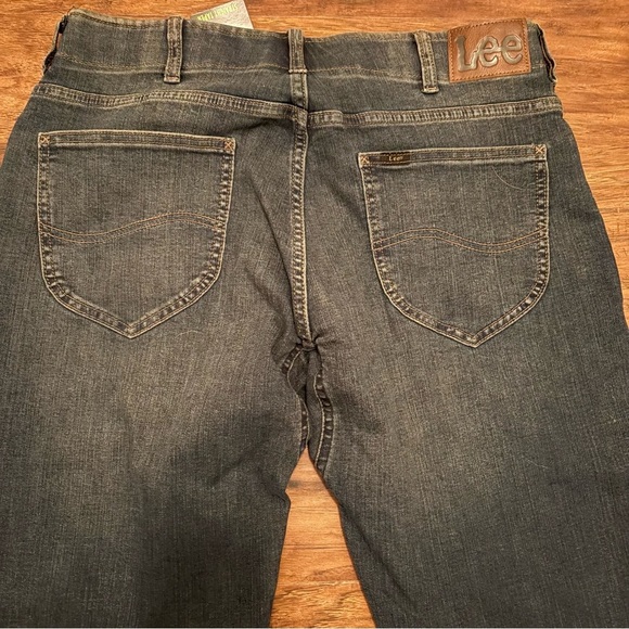 NWT MEN'S EXTREME MOTION TAPERED LEG JEAN SIZE 34x34 - Picture 7 of 9